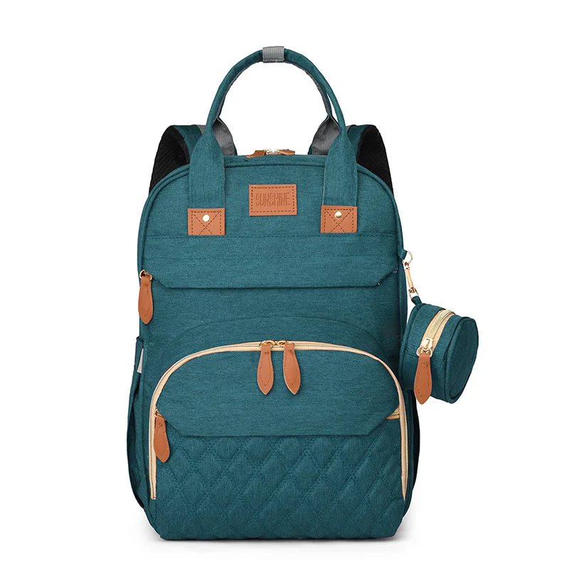 

Explosive backpack multifunctional mommy bag premium feeling mother and baby bed bag travel large capacity insulated backpack