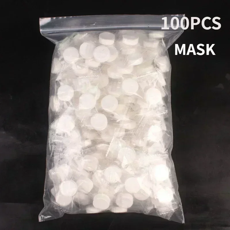 100pcs Disposable Compressed Facial Mask Portable Travel Non-woven Face Mask Skin Care Cotton Wrapped Masks Paper