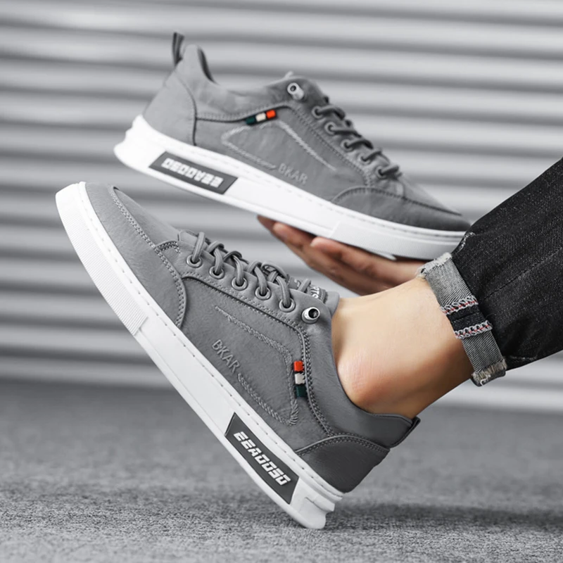 أحذية رجالية مسطحة منخفضة أعلى جولة اصبع القدم كتلة اللون مخطط عارضة أربعة مواسم خفيفة الوزن قماش تنفس أحذية المشي