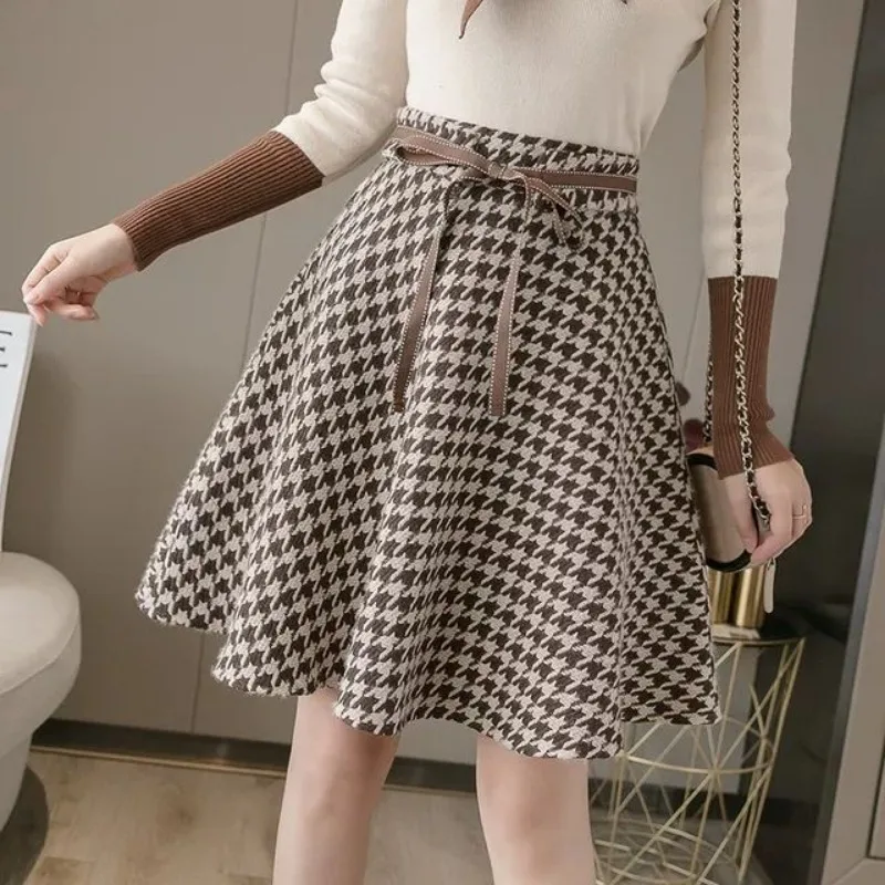 New Fashion Houndstooth Autumn Skirt Women Small Fragrance High End Elegant Design Sense Lace Up Bow A-line Pleated Skirts Jupe