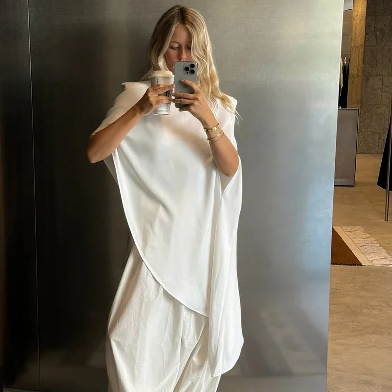 Damska bluzka Fmxires na jesień, jednolita, z zamkiem błyskawicznym z tyłu, asymetrycznym dołem, bez rękawów, luźna, uniwersalna, z wyściełanymi ramionami.