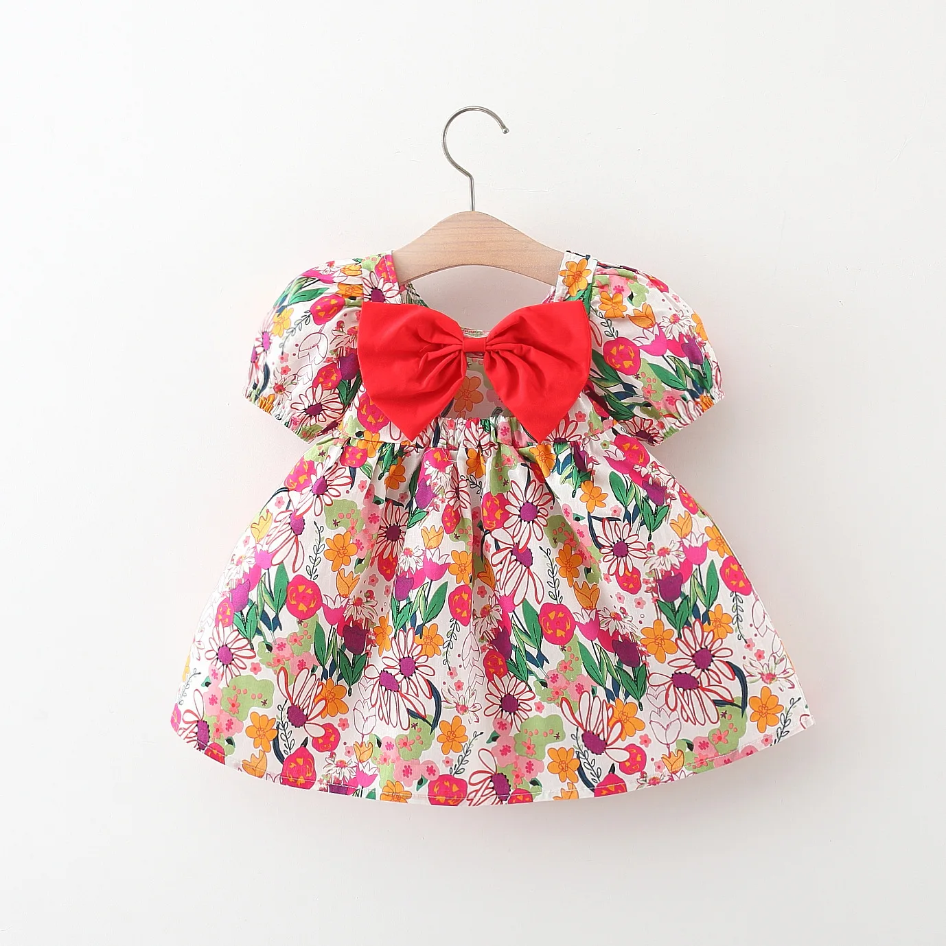 

Summer of 2024 New Girls Cool Cotton Dress with Hollow Bow Chrysanthemum Print