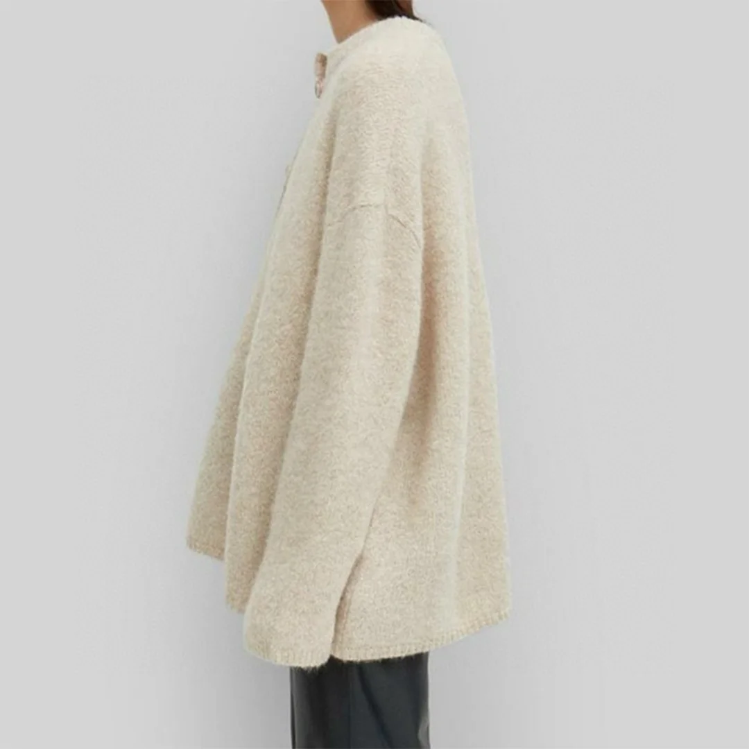 2025 outono/inverno moda suéter de manga comprida com gola assimétrica e bainha irregular para mulheres