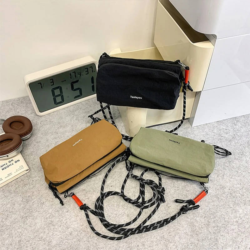 브랜드 휴대용 야외 메신저 가방 Ins 패션 간단한 가슴 가방 허리 가방 새로운 커플 땋은 밧줄 다기능 어깨 가방