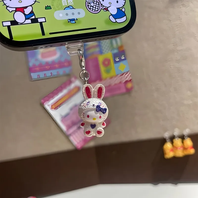 

Sanrio Hello Kitty Mobile Phone Pendant Dustplugs for iPhone 6-14 Lightning Charging Port Resin Keychain Dust Plug Decoration
