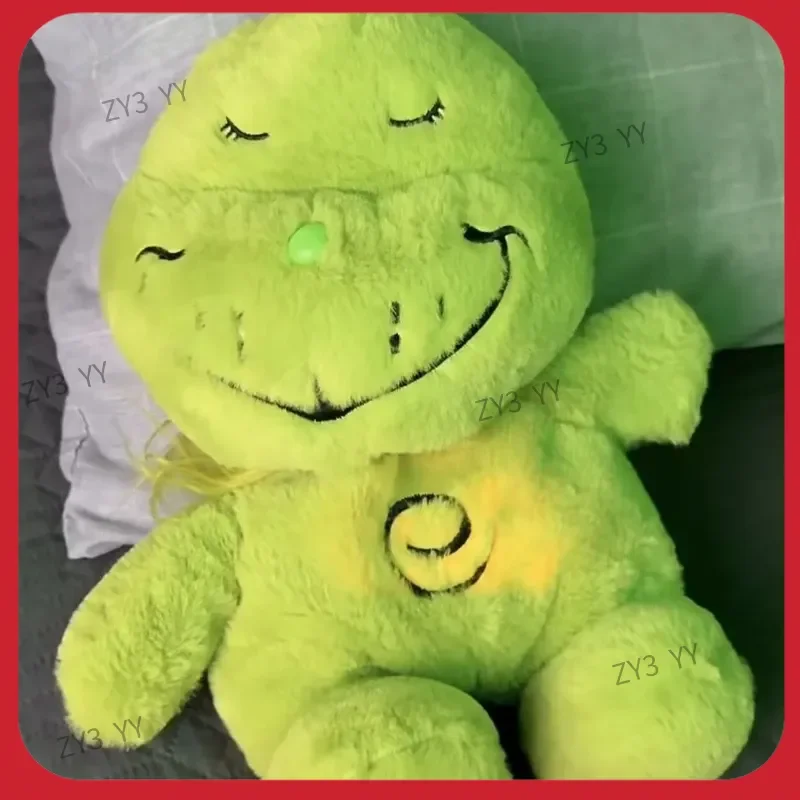 

In stock green furry anime plush toy dolls with glowing bellies, stuffed animals, and cute holiday gifts for friends