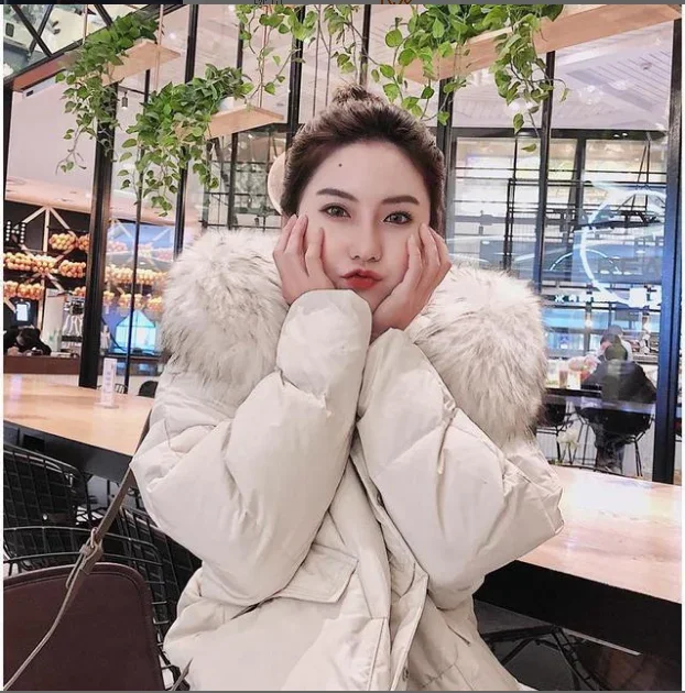 White duck down jacket female 2021 new winter Korean version of the knee large fur collar long thick small jacket