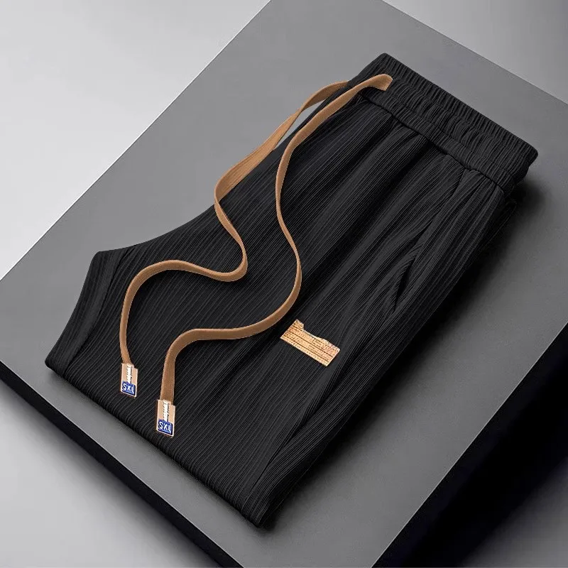 Nuovo 2025 da uomo in seta di ghiaccio sensazione di freschezza vestibilità ampia pantaloni a gamba dritta sottile Qui Dry sport estivo americano casual di grandi dimensioni