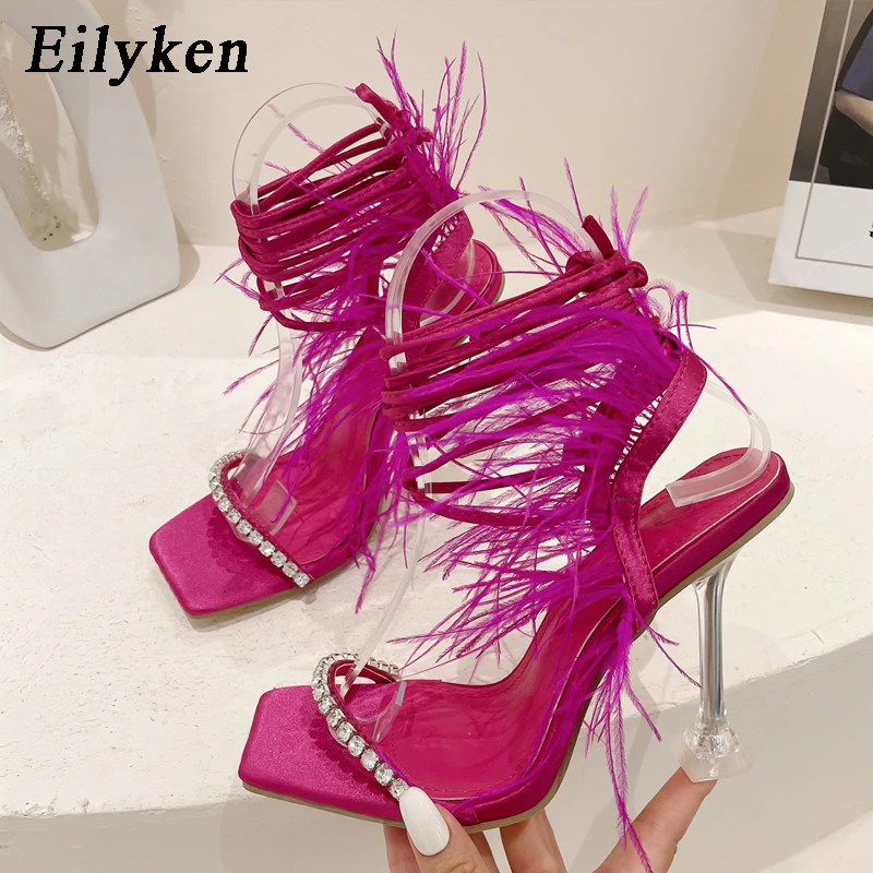 Eilyken New Design Womens Sandals Fashion Fuzzy Feather Summer Transparent High Heels Sexy Nightclub Stripper Shoes Purple Green