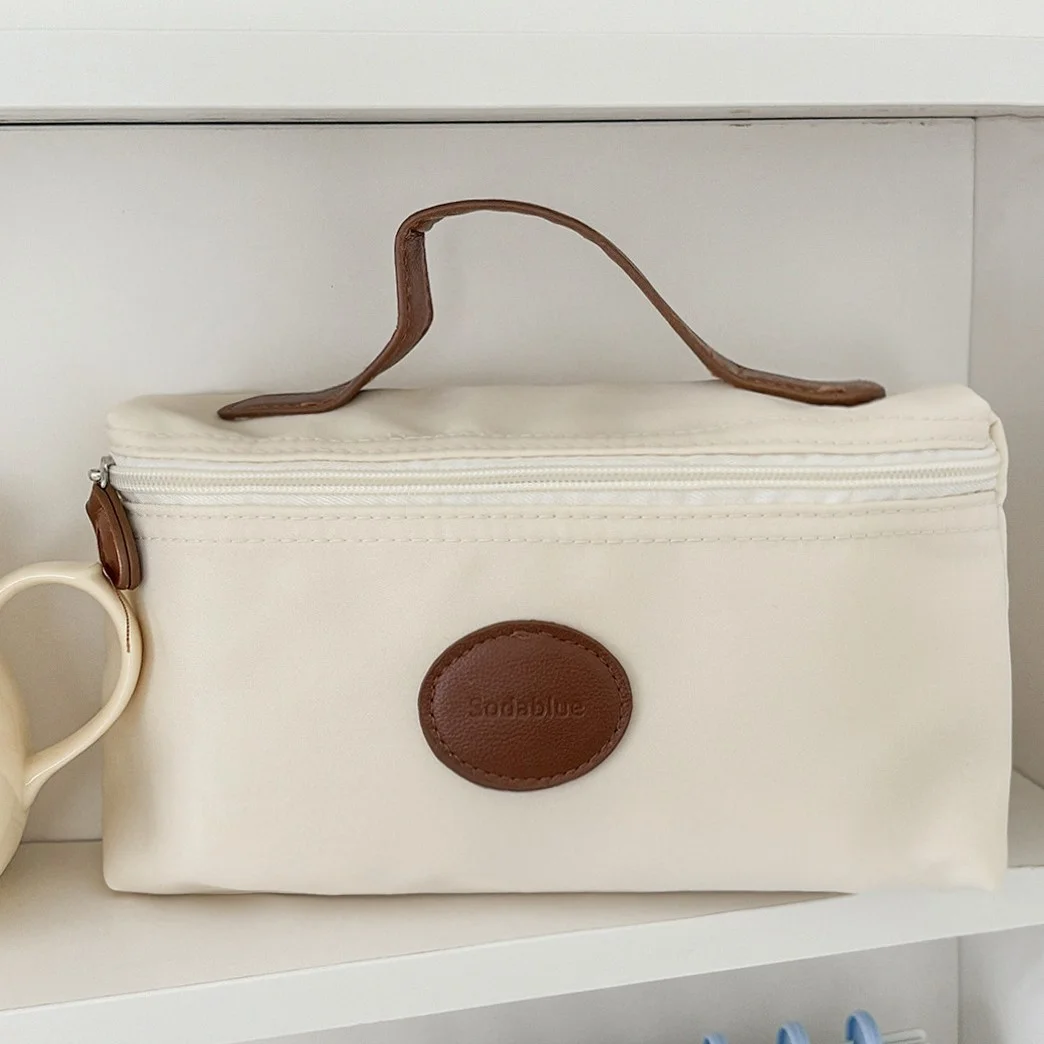 High-quality, stylish, lightweight, unisex portable toiletry bag with leather label, nylon handbag, new model