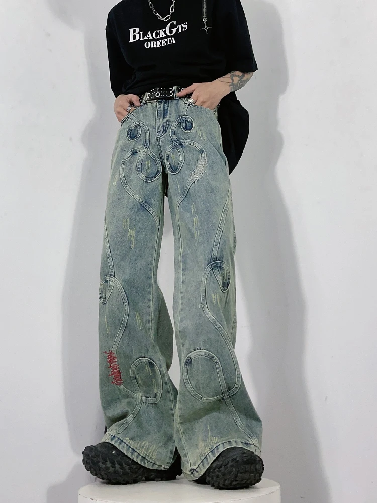 الرجعية الأمريكية تصميم المطرزة المرقعة نجا مايكرو متوهج الدينيم الجينز الرجال النساء واسعة الساق طول الأرض العلامة التجارية العصرية