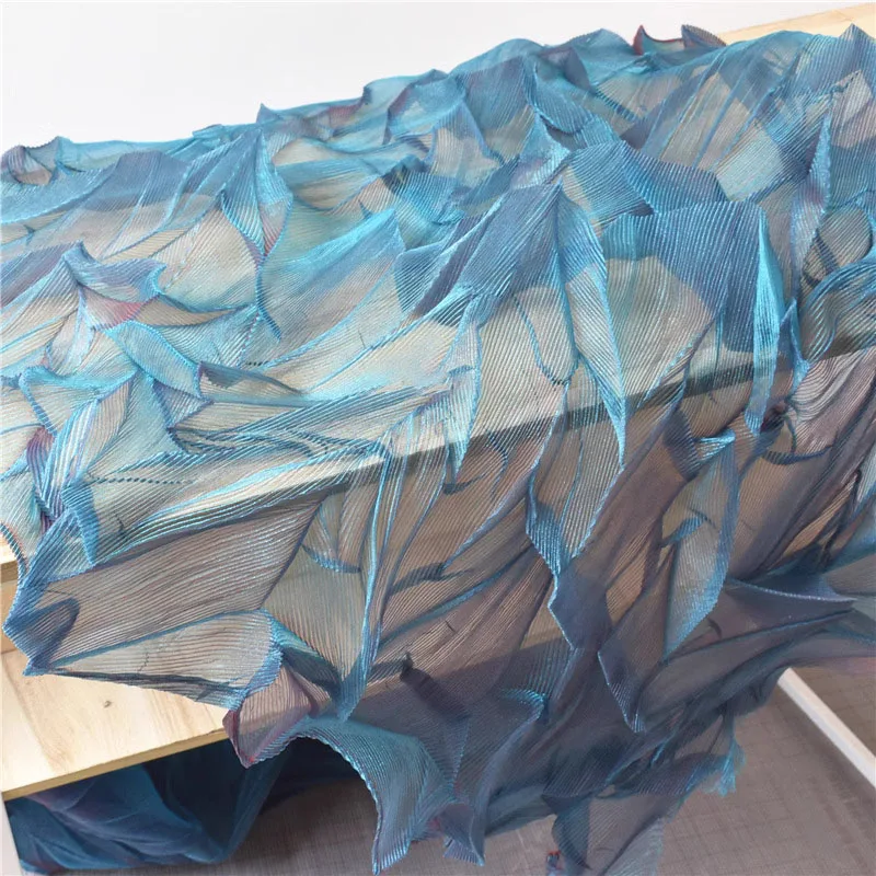 

Design wedding decoration background clothing with colorful fabrics Blue gradient laser pleated organza fabric