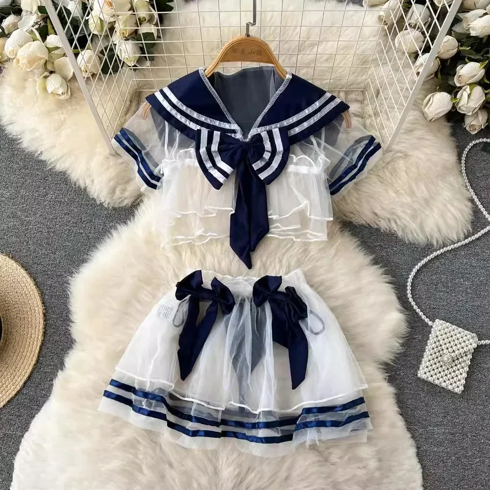 

Women's Sexy Transparent Sailor Student Uniform Cosplay Costume with Sheer Bowknot Stripe Patchwork Top + Mini Skirt 2-Piece Set