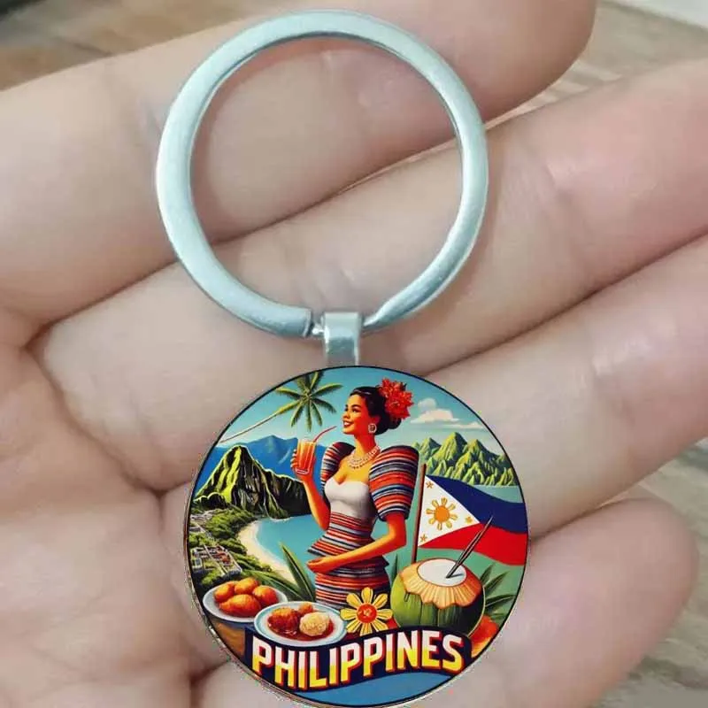 

The keychain background of "Philippine Tropical Customs and Cuisine" features the Philippine flag, tropical mountains, and coast