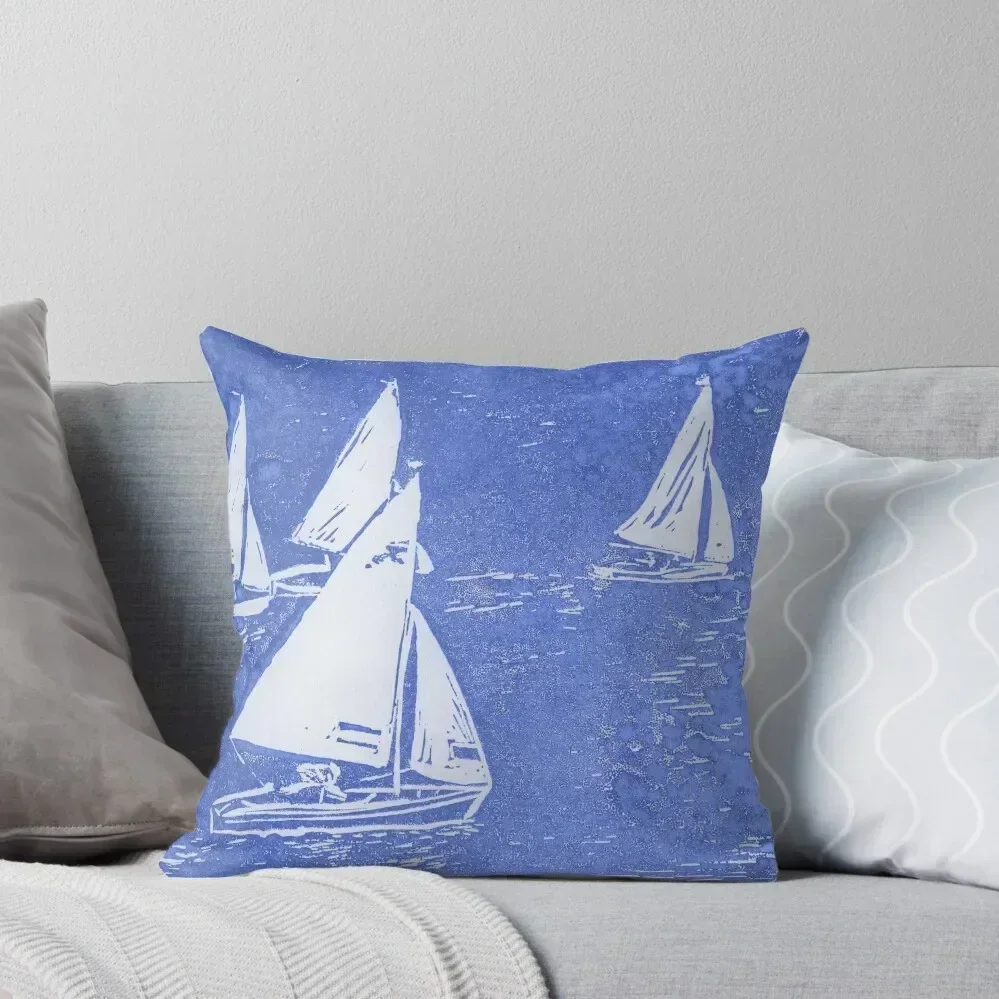 Lino cut print in blue of Seabird sailing boats off Ravenspoint, Trearddur Bay, Anglesey, in North Wales Throw Pillow