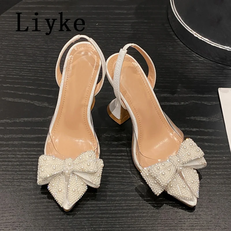 Liyke Summer Fashion Party Dress Slingback Shoes Pearl Bowknot Women Pumps Sexy Pointed Toe White High Heels Transparent Sandals