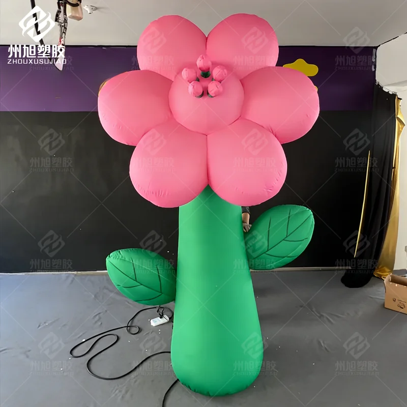 

Надувная рекламная конструкция в виде красного цветка большого размера для оформления торговых центров на открытом воздухе