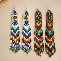Beaded earrings Long pattern Tassel Wavy Design Geometry Hand knitting Bohemia Alloy Fashion Simple Rice bead earrings