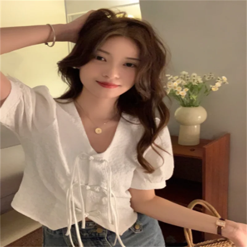 

New Chinese style white shirt for women's summer 2024 new button up design with irregular bubble short sleeved top