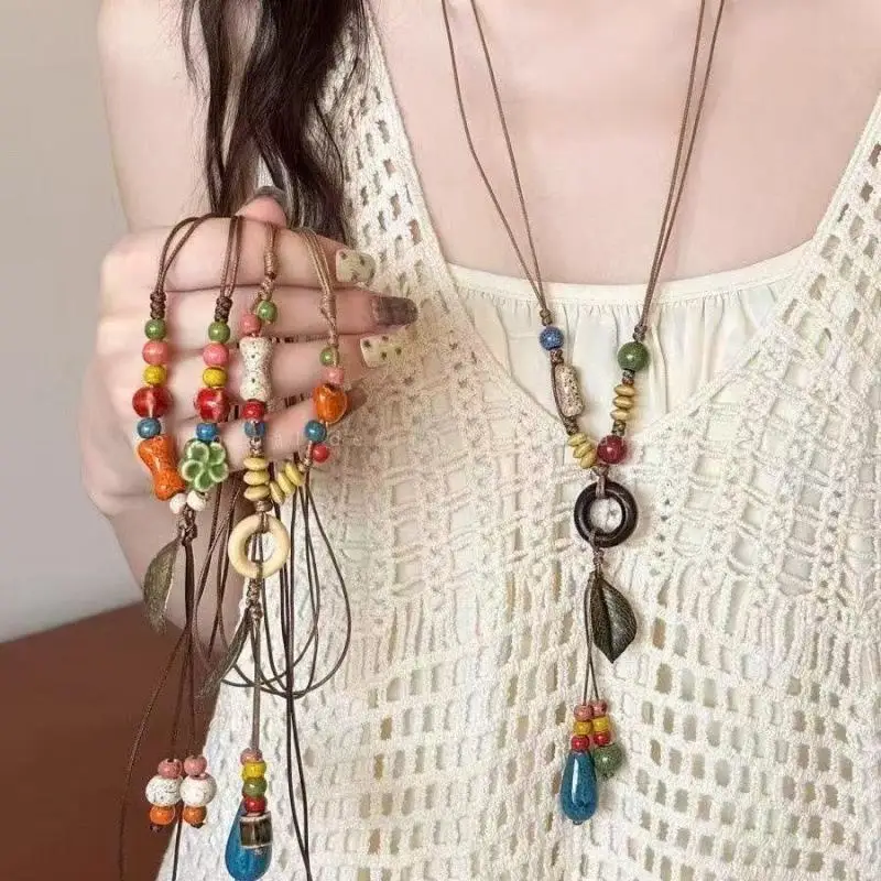 Neue Halskette im chinesischen Stil mit Keramikperlenanhänger für Damen, runde Blattform, lange Pulloverkette, ästhetischer Schmuck, Geschenk – Detail 1