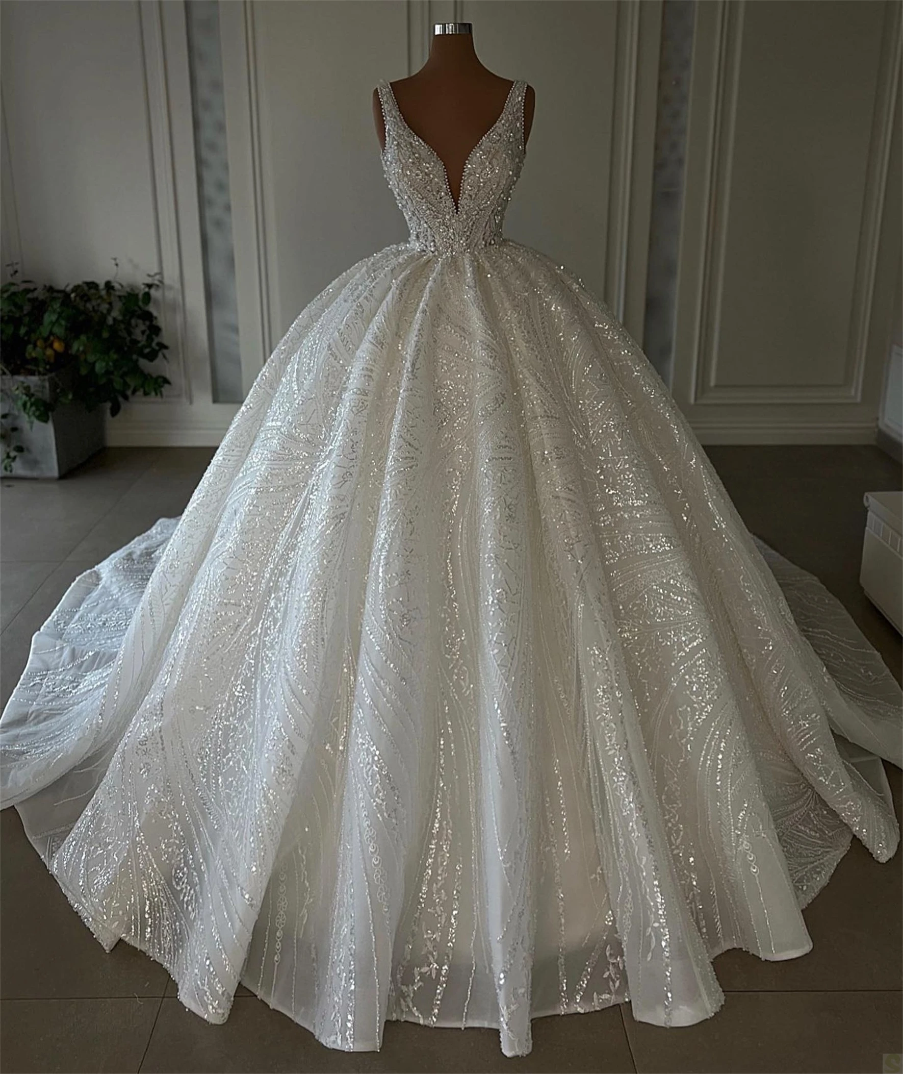 

2025 Luxury Sparkly Puffy Wedding Dresses Beads V Neck Sleeveless Beads Sequins Church Bridal Gowns Vestidos De Noiva