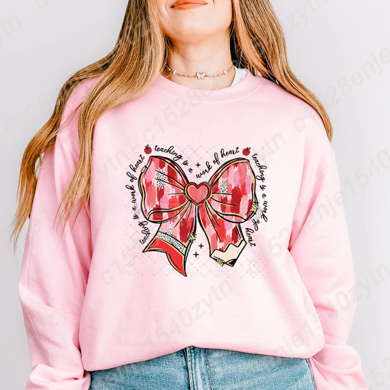 New Fashion Women's Long Sleeve Hoodless Pullovers Valentine's Day Bow Teaching Is A Work Of Heart Graphic Round Neck Sweatshirt