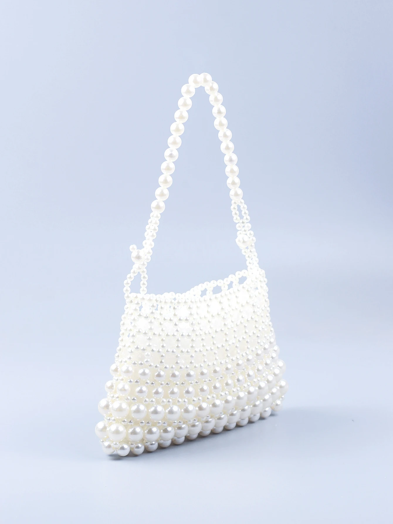 New internet celebrity 2024 Pearl Bag Women\'s Handmade Hollow Beaded Bag French Retro Handheld Women\'s Bag