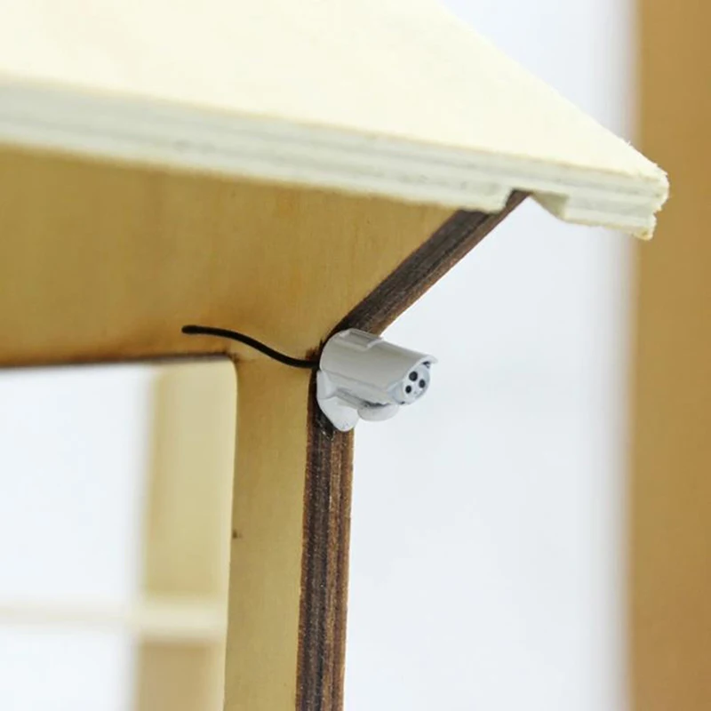 Cámara en miniatura para casa de muñecas, modelo 1/12, Mini cámara de vigilancia de simulación, accesorios de decoración para casa de muñecas, 1 ud.
