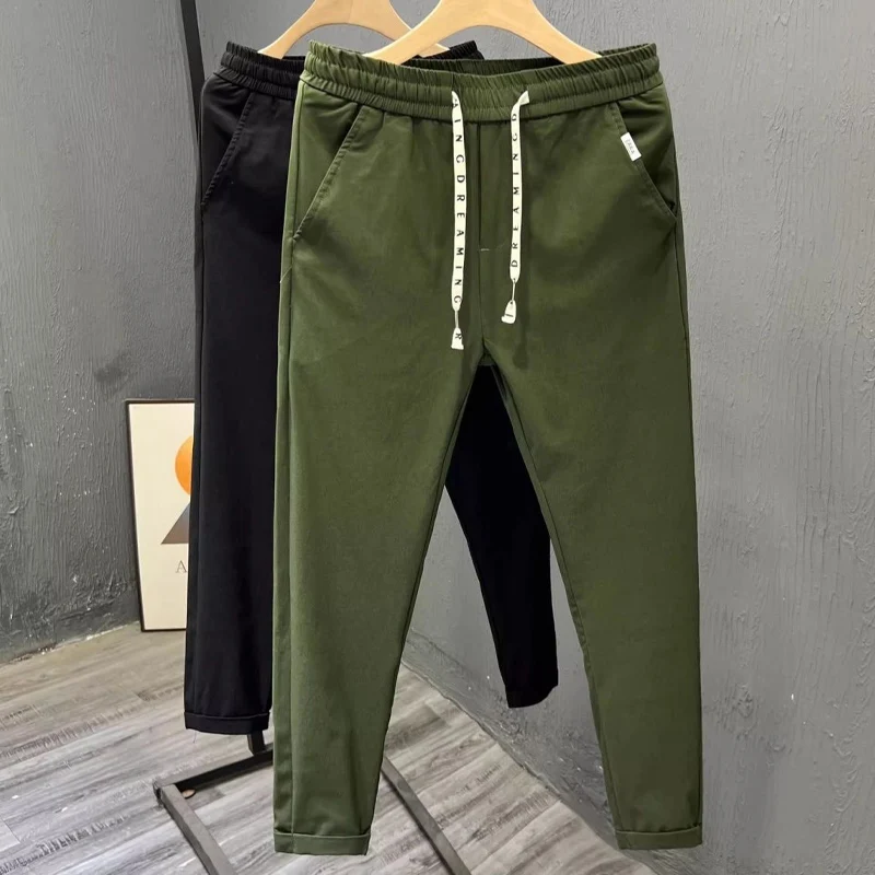 Calça masculina com harem elástica monocromática, bolsos altos, cordão com retalhos, comprimento do tornozelo que combina com tudo, moda verão