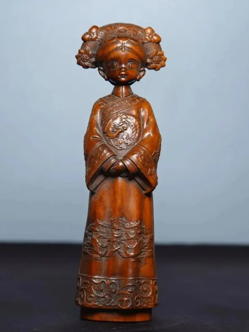Natural hawthorn wood carved female figurine. A decorative item for home tabletop or office use. A small piece of furniture.