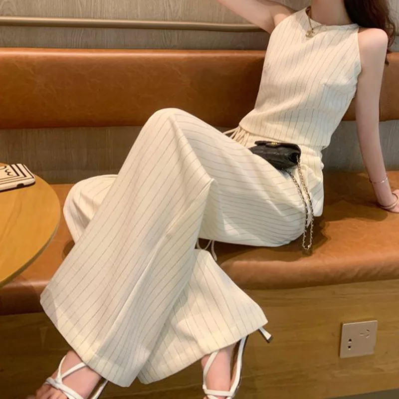 Small fragrance suit female 2024 summer new high sense niche temperament striped vest wide-leg pants two-piece.