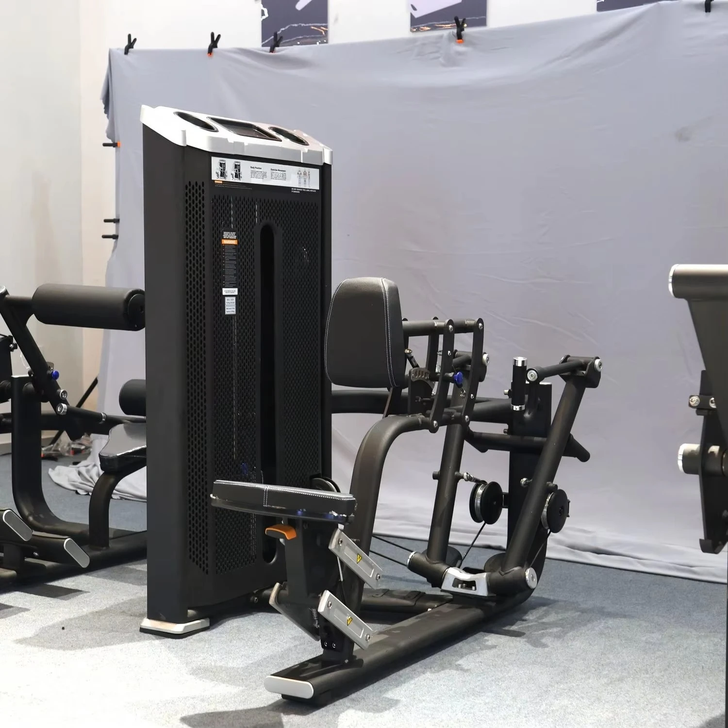Professional gym-grade steel seated rowing machine with safety features, designed for arm, chest, and back workouts.