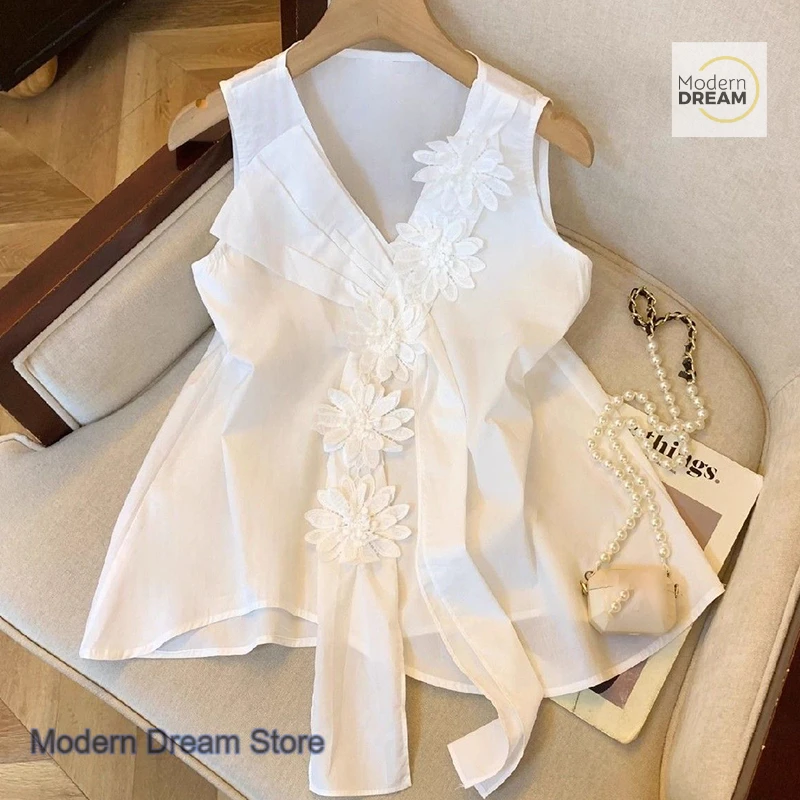 

French chic flower ribbon sleeveless shirt female summer new fashion design temperament V-neck doll shirt casual chiffon top.