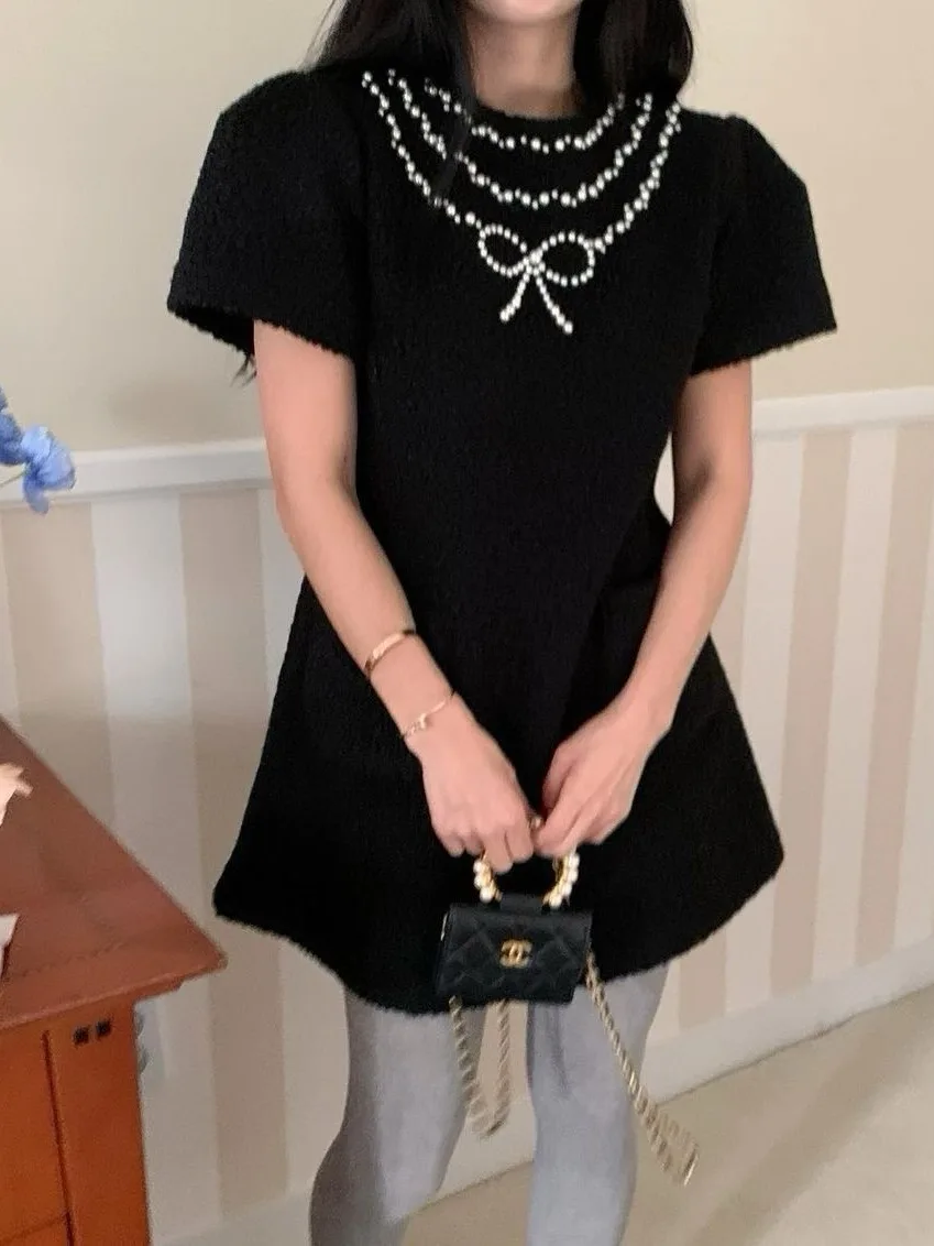 لؤلؤة مزخرفة ort Sve Dr Women's Faion 2024 اسم جديد Lady Small Cro ort تنورة Ele Commute Sle حصيرة أخرى...