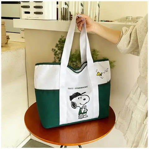 Ny Snoopy damhandväska, trendig axelväska, stor kapacitet, tryckt, avslappnad, liten och fräsch, tygväska i kanvas 12 best sales Snoopy Zara - №9