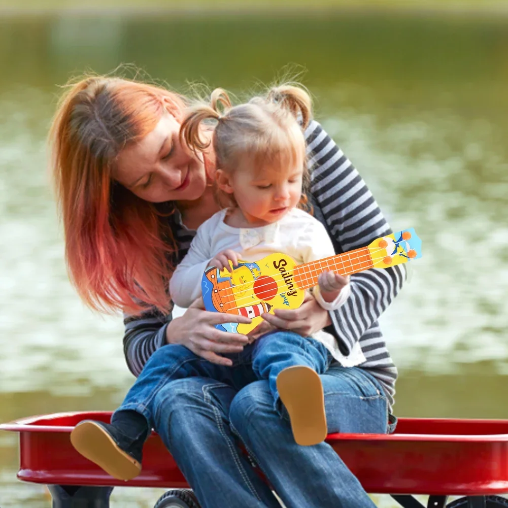 جيتار للأطفال أطفال آلات موسيقية القيثارة لعبة جيتار صغيرة أربعة سلسلة ألعاب تعليمية للبنات والأولاد التنوير