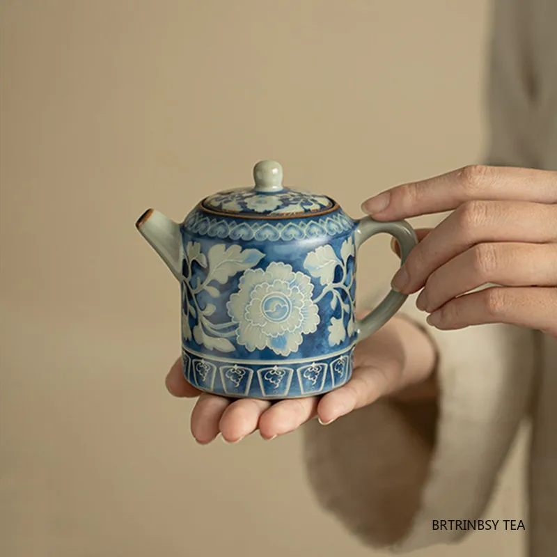 

Chinese Ru Kiln Ceramic Teapots Handmade Flowers Pattern Ball Hole Filter Tea Pot Household Beauty Kettle Travel Tea Set 150ml
