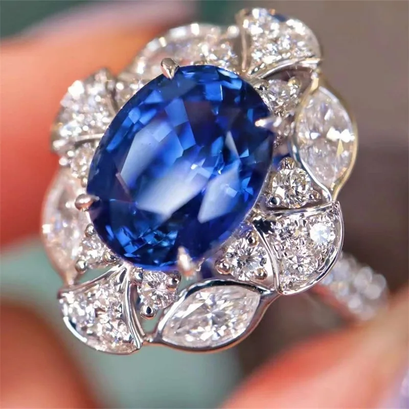 Huitan Temperament blau Zirkonia Ringe für Frauen voll bling vereist Braut Eheringe Jubiläums geschenk Modeschmuck