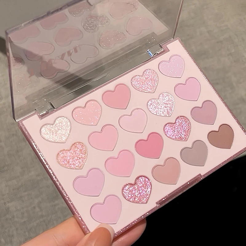 พาเลทอายแชโดว์รูปหัวใจ 20 สี สีชมพูหวาน พร้อมกลิตเตอร์มุก แต่งหน้าแบบธรรมชาติสไตล์เกาหลี ช่วยเพิ่มความกระจ่างใส ใช้ได้ทั้งเป็นบลัชออนสำหรับผู้หญิง
