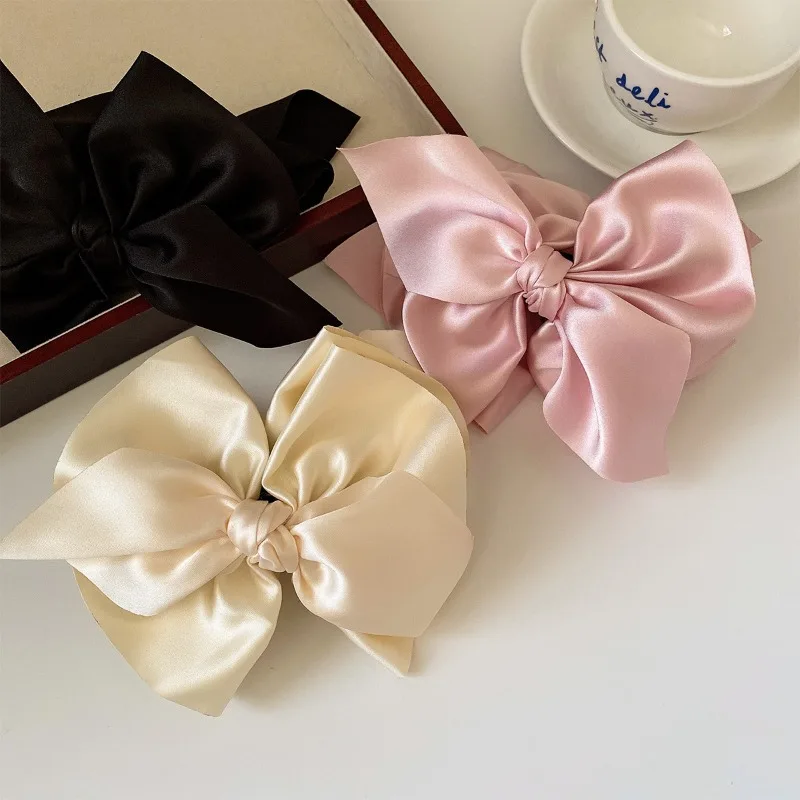 

Sweet Fashion Satin Giant Bow Hair Clip for Girls Half Up Hair Claw for Women Bun Ponytail Holder Hair Accessories Back of Head