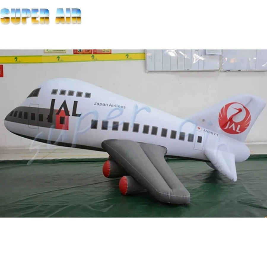 Decoración de modelo de diseño especial, avión blanco inflable gigante sentado en el suelo para espectáculo