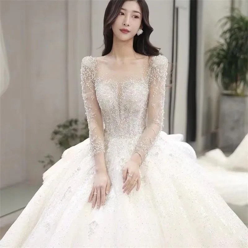 

Main wedding dress 2023 new bride French big tail high quality one shoulder long sleeve heavy industry