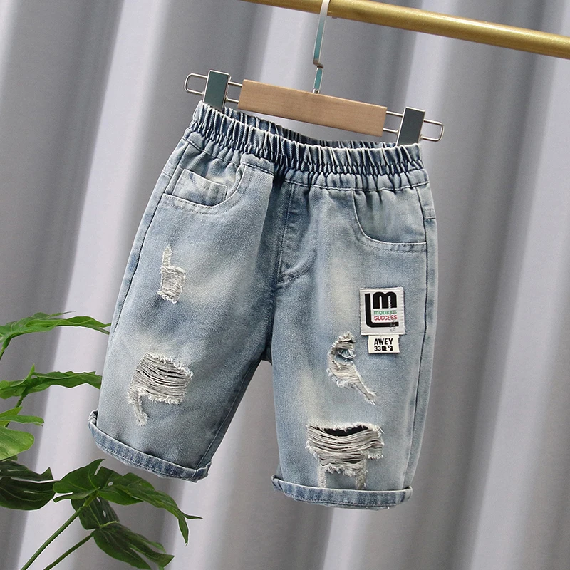 Boys with ripped jeans, trendy single pants, black children\'s spring and autumn, and trendy baby spring clothing trend