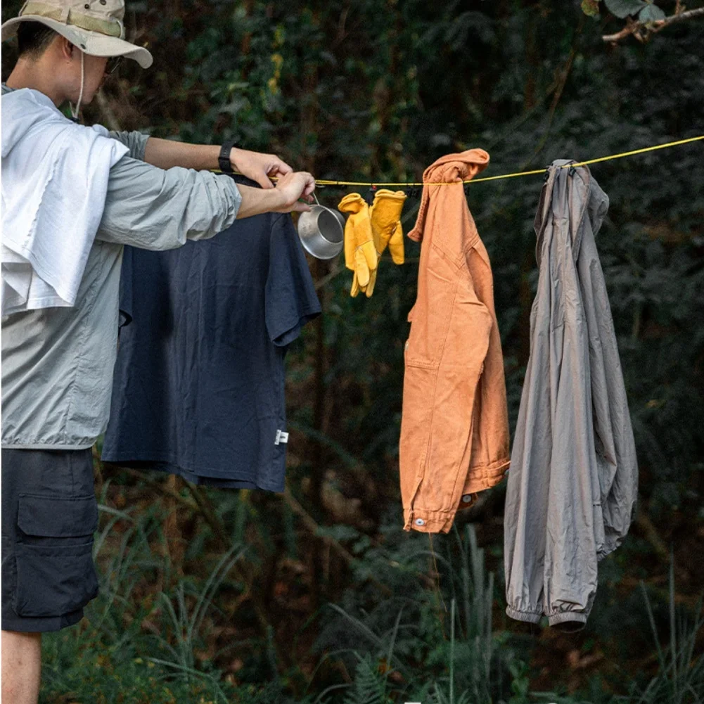 

portable clothes drying rope with clip attachments adjustable length nylon line and integrated storage pouch for hiking