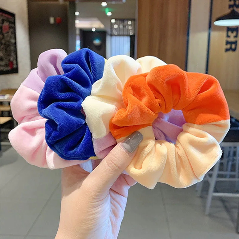 

Korean wind net red autumn and winter color collision plush hair band ladies ponytail elastic hair band