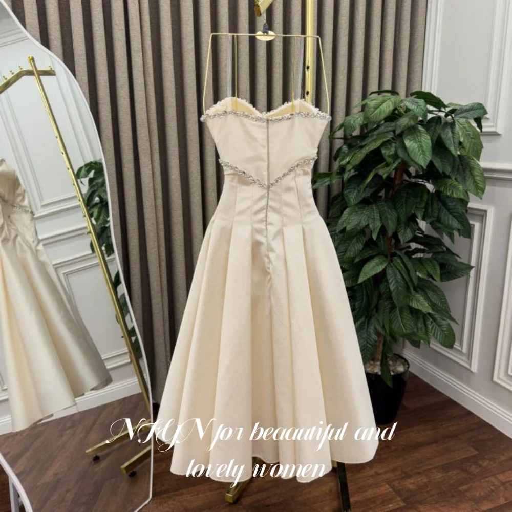 NFYN robe de soirée tache ivoire une ligne chérie robe de nuit sans manches plis de cristal a-ligne robe de soirée balayage Train personnalisé
