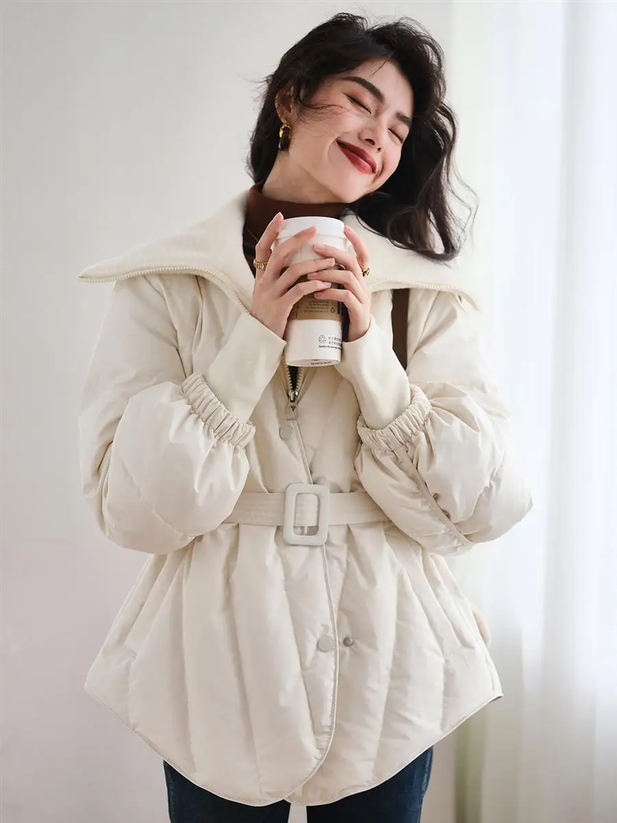 ฤดูหนาวใหม่ผู้หญิงลงเสื้อพลิกปกปลอมสองพร็อพลดน้ําหนักแจ็คเก็ต