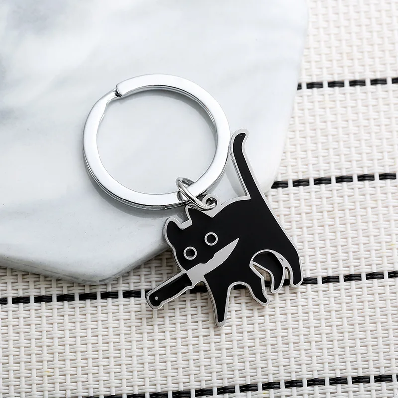 New Cute Funny Black Cat Gripping The Knife Key Chain for Women Men Cartoon Anime Backpack Key Ring Creativity Friendship Gift