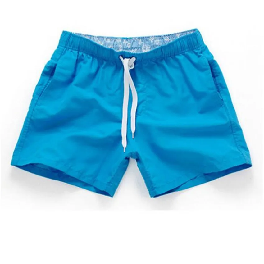 Solid color sports shorts for men\'s summer 2024 hot selling beach pants for loose and casual sports