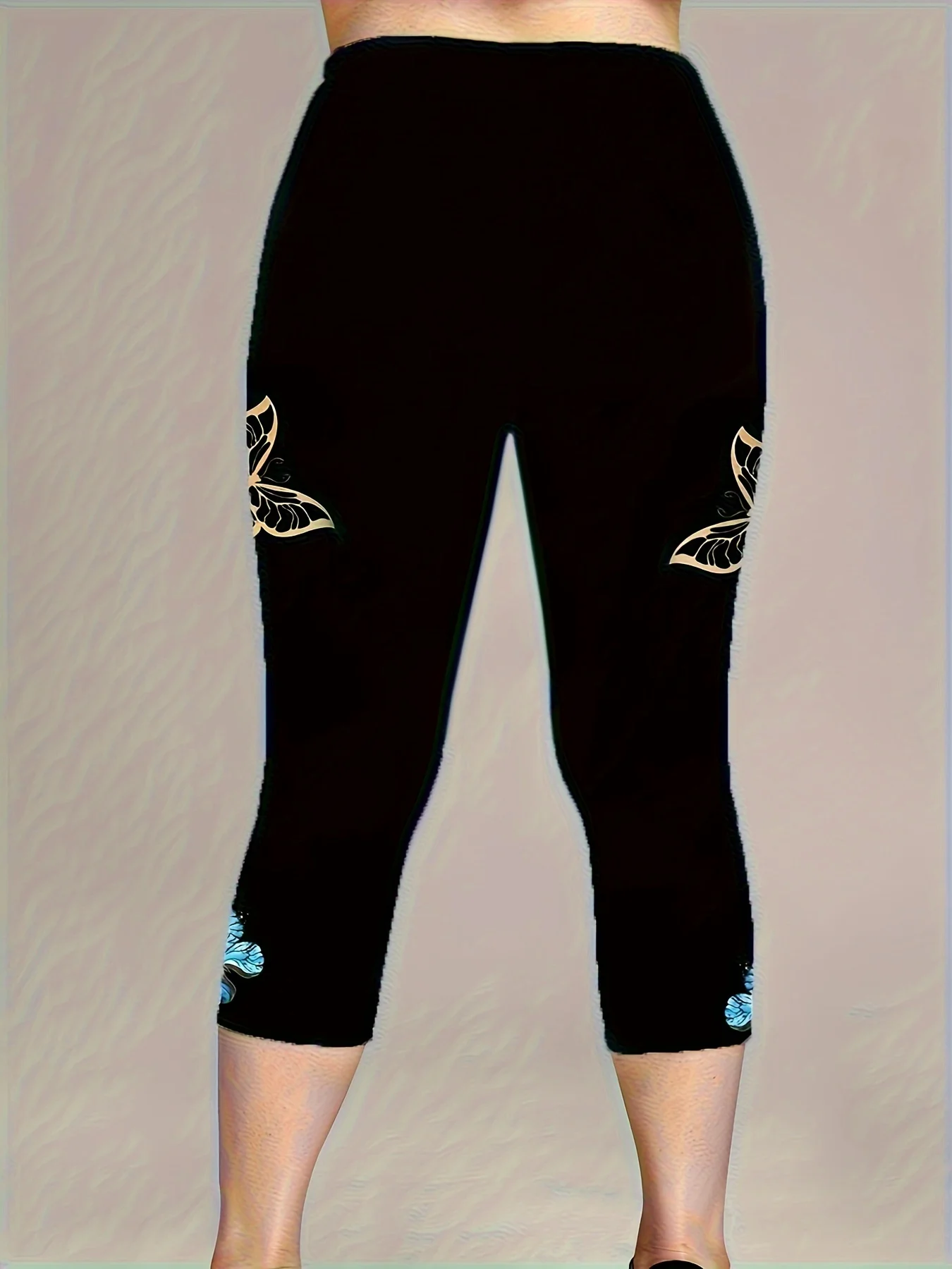 A two-piece set of casual and fashionable butterfly print pullover T-shirt and capri pants for Spring/Summer 2026